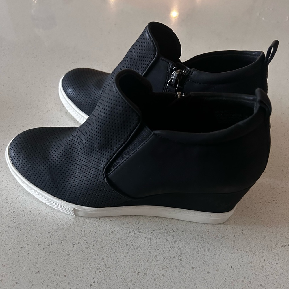 Brand new women’s size 9 wedge shoes black and white.